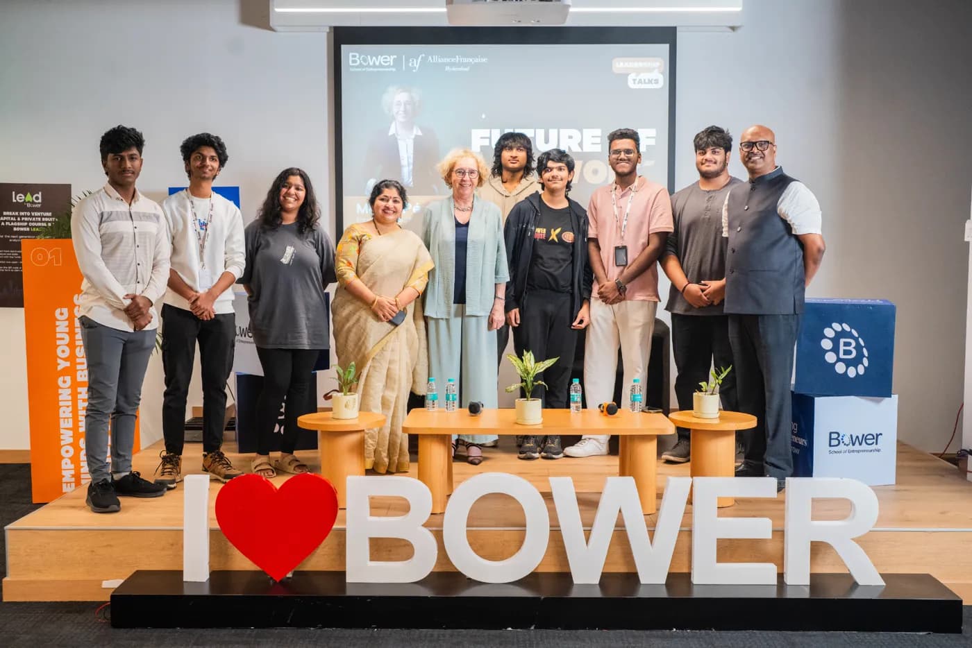 Bower students and mentors on stage at a leadership talk